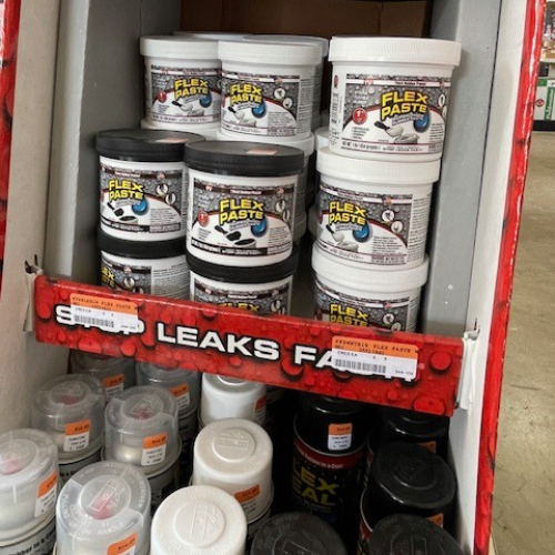 Close-up of our display featuring the Flex Seal Family of Products, with a focus on Flex Paste.